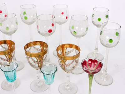 Lot 282 - Ten hock glasses with green and red sunburst...