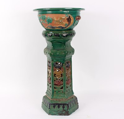 Lot 300 - A painted terracotta jardiniere on stand,...