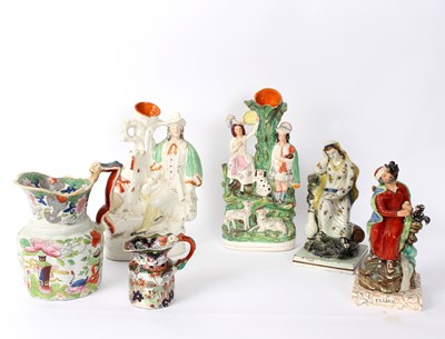 Lot 317 - Two 19th Century Staffordshire figures, Elijah...