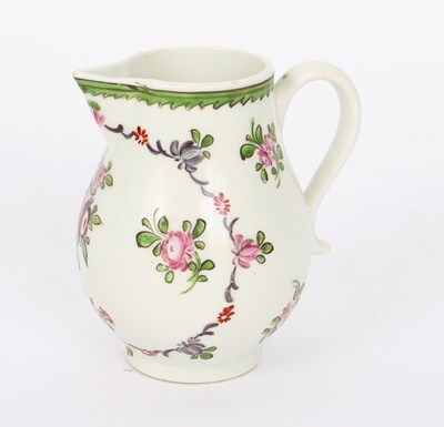 Lot 344 - A Lowestoft milk jug painted flower sprays,...