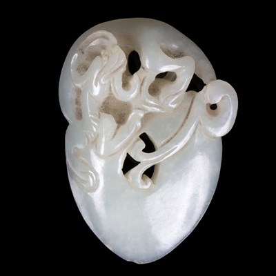 Lot 370 - A pale celadon jade carving of a kylin...