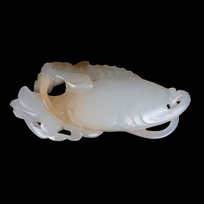 Lot 371 - A white jade carving of a fish, 18th/19th...