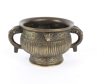 Lot 386 - A Chinese bronze censer of Archaic form with...