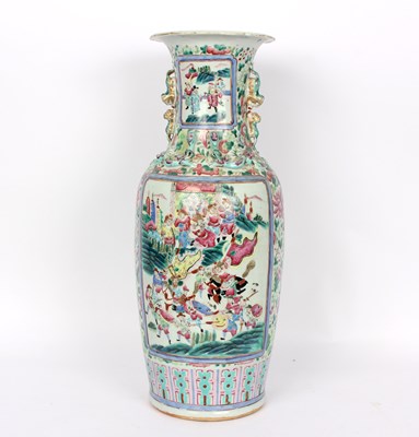 Lot 397 - A Cantonese vase with reserves of figures...