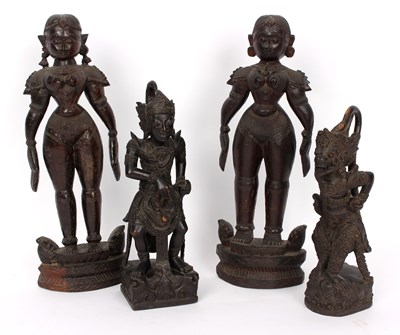 Lot 399 - A pair of South Indian carved wood figures of...