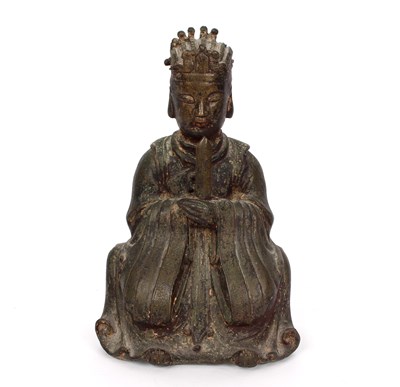 Lot 402 - A Chinese late Ming bronze figure of the...