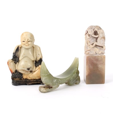 Lot 438 - A Chinese carved soapstone figure of Buddha,...