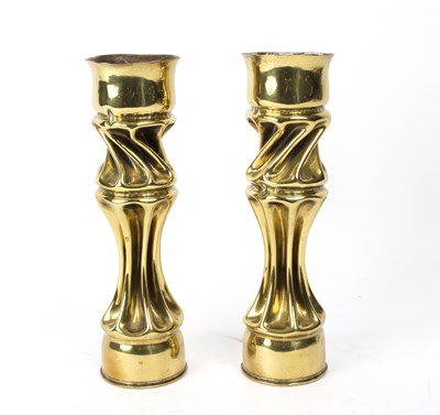 Lot 459 - A pair of trench art candlesticks with spiral...