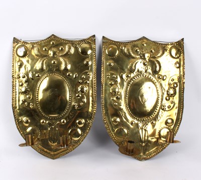 Lot 461 - A pair of Dutch brass shield-shaped girandoles,...