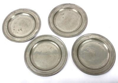 Lot 466 - A pewter charger with incised border,...