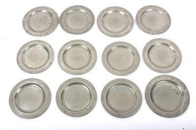 Lot 467 - A composite set of twelve pewter plates all...