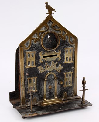 Lot 508 - A Victorian money box modelled as a bank,...