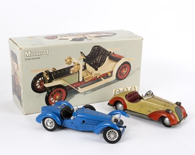 Lot 510 - A German tinplate clockwork open-top car by...