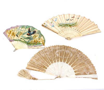 Lot 711 - A Brussels lace fan with mother-of-pearl...