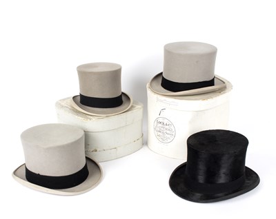 Lot 717 - Three grey top hats, two by Lock & Co, and a...