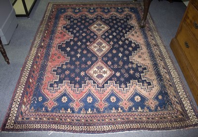 Lot 734 - An Eastern carpet, the three central...