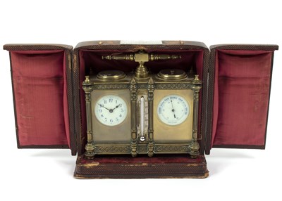 Lot 773 - An Edwardian clock/barometer, in a gilt brass...