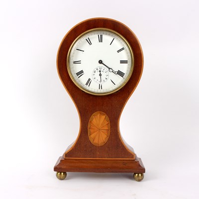 Lot 776 - An Edwardian mahogany eight-day alarm mantel...