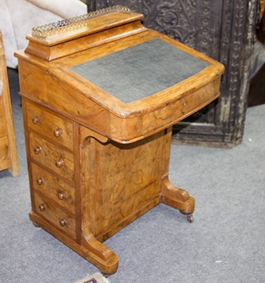 Lot 795 - A Victorian walnut Davenport with stationery...