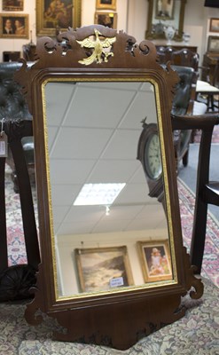 Lot 817 - A George III fret carved wall mirror, with ho...