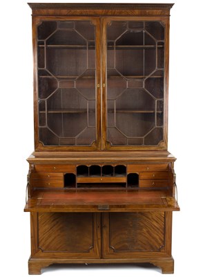 Lot 846 - A George III mahogany secretaire bookcase, the...