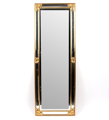 Lot 854 - A modern mirror with a mirrored glass frame,...