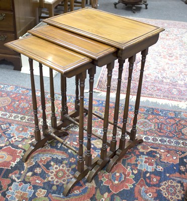 Lot 874 - A nest of three mahogany tables, late 19th...