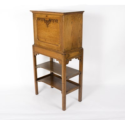 Lot 887 - A student's early 20th Century oak secretaire...