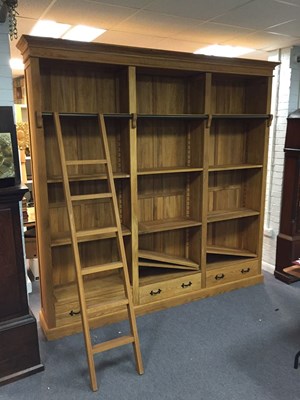 Lot 936 - An Oka pine library bookcase, fitted...