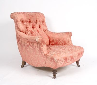 Lot 939 - A Howard style low armchair with buttoned back,...