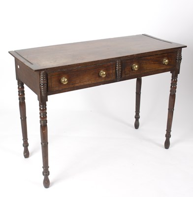 Lot 947 - A Regency mahogany dressing table, fitted two...