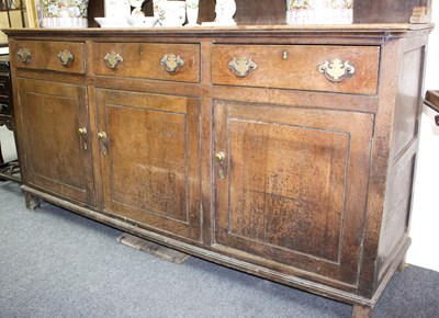 Lot 958 - An oak dresser with shelves over, fitted...