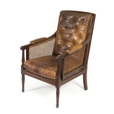 Lot 962 - A Regency mahogany framed bergere chair, with...