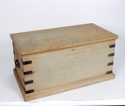 Lot 984 - A pine chest with hinged lid and carry handles...