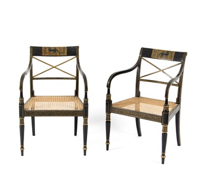 Lot 1011 - A pair of Regency ebonised open armchairs,...