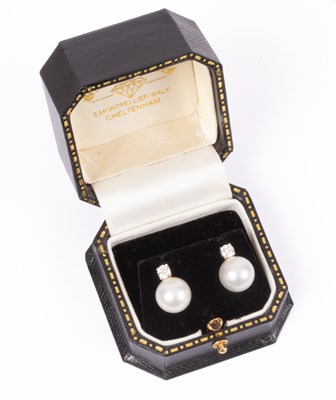 Lot 34 - A pair of 18ct white gold, diamond and cultured pearl stud earrings