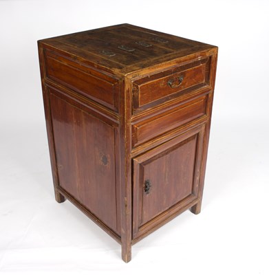 Lot 1014 - An Indonesian chest with cupboard and drawer...