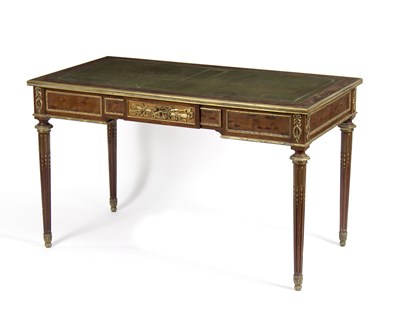 Lot 1015 - A Louis XVI style walnut and gilt metal...