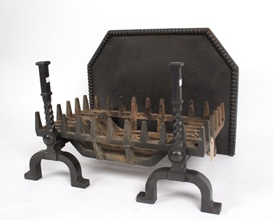 Lot 1019 - A basket grate and cast iron fire back