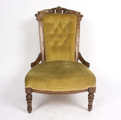 Lot 1022 - A late Victorian carved walnut chair on turned...