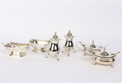 Lot 37 - A matched silver cruet set, various dates,...