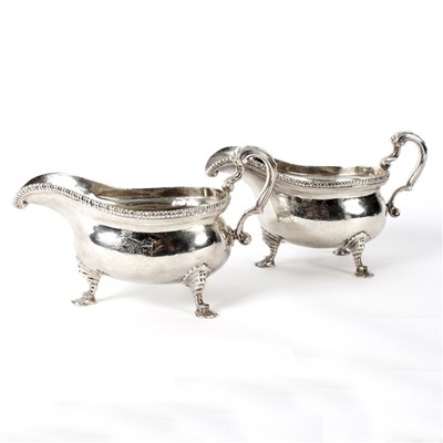 Lot 54 - A pair of George II silver sauce boats,...