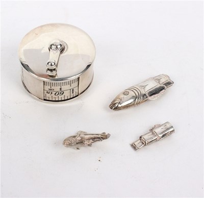 Lot 59 - A novelty silver cased tape measure, WW,...