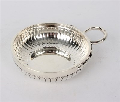 Lot 73 - A Cartier silver wine taster, signed Cartier...