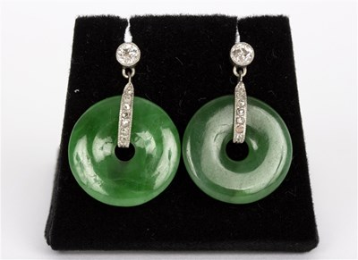 Lot 91 - A pair of jadeite and diamond ear pendants,...