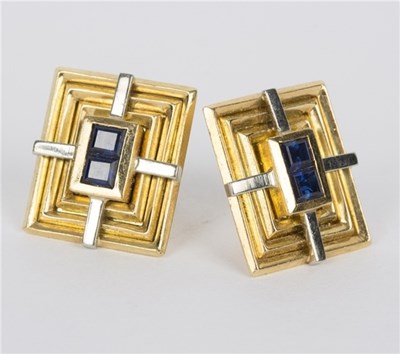 Lot 97 - A pair of sapphire ear studs in bi-coloured...