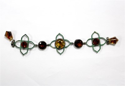 Lot 100A - An Arts and Crafts enamel and citrine bracelet,...