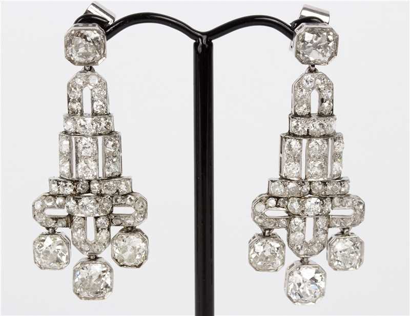 Lot 125 - A pair of Art Deco diamond ear pendants, of...
