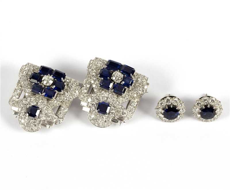 Lot 133 - An Art Deco sapphire and diamond double clip...