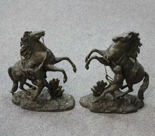 Lot 297 - Two spelter Marly type horses, 40cm high